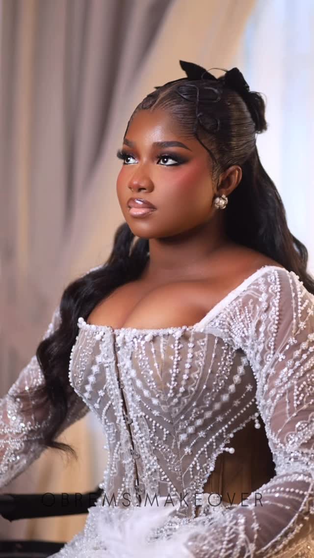 Bridal soft glam with sculpted eyes.